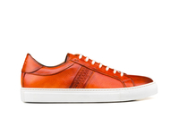 Caracalla - Low top orange steam crust leather sneakers