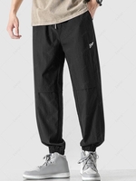 Contrasting Letter Patch Pants Xs Black