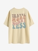 Oversized TRAVEL MORE WORRY LESS Graphic T-shirt L Light coffee