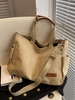 Patched Canvas Shoulder Bag