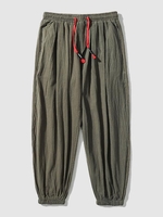 Slant Pocket Drawstring Textured Casual Jogger Ninth Pants M Deep green